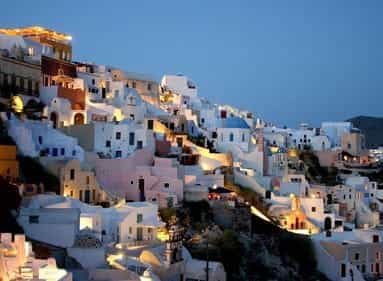 Little white buildings on the hill in Santorini, Greece