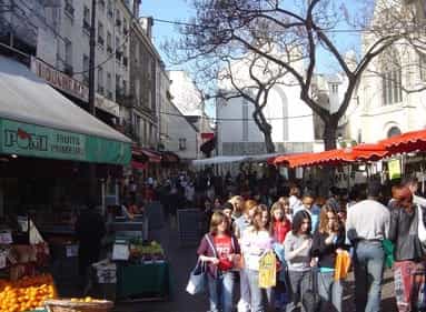 many people on the street in Paris, France